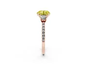 Fancy Yellow Round Cut Diamond Three-Stone Ring Set in Rose gold with Pavé Band and Graduated Sides