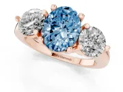 Fancy Blue Oval Cut Diamond Three-Stone Ring Set in Rose gold with Prong Setting and Classic Band