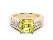 Fancy Yellow Asscher Cut Diamond Solitaire Ring Set in Yellow gold with Channel-Set Accent Stones and Prong Setting