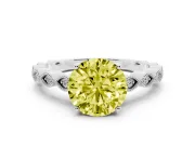 Fancy Yellow Round Cut Diamond Solitaire Ring Set in White gold with Infinity Twist Pavé Band