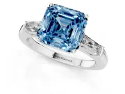 Fancy Blue Asscher Cut Diamond Solitaire Ring Set in Silver with Tapered Baguette Side Stones and Prong Setting