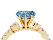 Fancy Blue Heart Cut Diamond Solitaire Leaf-Inspired Ring Set in Yellow gold with Pavé Band and Prong Setting