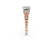 Emerald Cut Diamond Three-Stone Ring Set in Rose gold with Braided Band