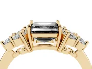 Fancy Black Asscher Cut Diamond Solitaire Ring Set in Yellow gold with Cluster Accents on Each Side