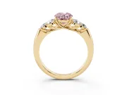 Fancy Pink Oval Cut Diamond Cluster Ring Set in Yellow gold with Round Accent Stones and Prong Setting on a Plain Band