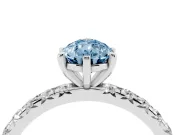 Fancy Blue Pear Cut Diamond Pavé Solitaire Ring Set in White gold with Round Band and Prong Setting