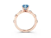 Fancy Blue Cushion Cut Diamond Solitaire Ring Set in Rose gold with Bezel Set Side Stones and Prong Setting