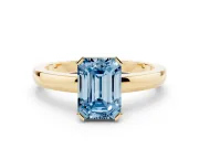 Fancy Blue Emerald Cut Diamond Solitaire Ring Set in Yellow gold with Prong Head and Smooth Polished Band