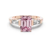 Fancy Pink Emerald Cut Diamond Solitaire Ring Set in Rose gold with Tapered Baguette Side Stones and Prong Setting