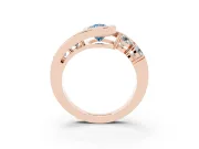 Fancy Blue Pear Cut Diamond Bezel Bypass Ring Set in Rose gold with Round Accents