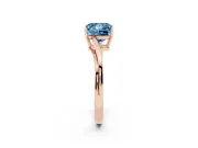 Fancy Blue Princess Cut Diamond Solitaire Twist Band Ring Set in Rose gold with Prong Setting