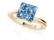 Fancy Blue Princess Cut Diamond Solitaire Twist Band Ring Set in Yellow gold with Prong Setting