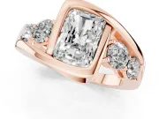 Radiant Cut Diamond Bezel Bypass Ring Set in Rose gold with Round Accents