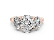 Oval Cut Diamond Three-Stone Ring Set in Rose gold with Braided Band