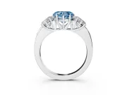 Fancy Blue Heart Cut Diamond Three-Stone Ring Set in White gold with Bold Center and Classic Band