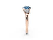 Fancy Blue Heart Cut Diamond Three-Stone Ring Set in Rose gold with Bold Center and Classic Band