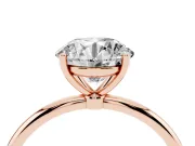 Round Cut Diamond Solitaire Engagement Ring Set in Rose gold with Thin Band and Prong Setting