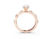 Pear Cut Diamond Solitaire Ring Set in Rose gold with Bezel Set Side Stones and Prong Setting