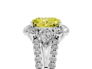 Fancy Yellow Radiant Cut Diamond Halo Split Shank Engagement Ring Set in White gold with Prong-Held Center Stone