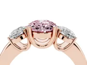 Fancy Pink Oval Cut Diamond Three-Stone Ring Set in Rose gold with Polished Band and Prong Setting
