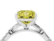 Fancy Yellow Princess Cut Diamond Solitaire Set in White gold with Side Baguettes and Channel Set Band