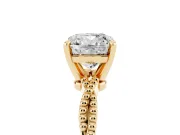 Cushion Cut Diamond Solitaire Ring Set in Yellow gold with Twisted Band and Bead Prong Setting