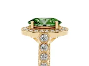 Fancy Green Oval Cut Diamond Milgrain Halo Solitaire Ring Set in Yellow gold with Bezel Set Side Stones and Pavé Band