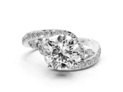 Round Cut Diamond Solitaire Ring Set in White gold with Pavé Twist Band and Secure Prong Setting