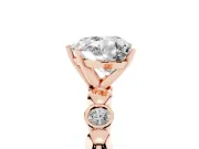 Heart Cut Diamond Solitaire Ring Set in Rose gold with Bezel-Set Accents on Beaded Band and Prong Setting