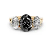 Fancy Black Oval Cut Diamond Three-Stone Ring Set in Yellow gold with Bold Center and Classic Band