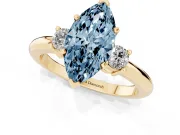 Fancy Blue Three-Stone Marquise Cut Diamond Ring Set in Yellow gold with Prong Setting and Plain Band
