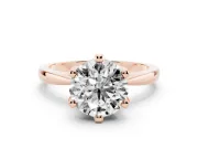 Round Cut Diamond Solitaire Engagement Ring Set in Rose gold with Slim Tapered Solitaire Band