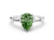 Fancy Green Pear Cut Diamond Solitaire Ring Set in Silver with Tapered Baguette Accents and Prong Setting