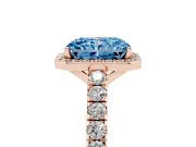 Fancy Blue Radiant Cut Diamond Halo Engagement Ring Set in Rose gold with Pavé Band and Prong Setting