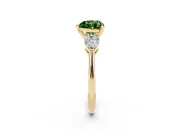 Fancy Green Three-Stone Heart Cut Diamond Ring Set in Yellow gold with Pear Side Stones and Prong Setting