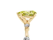 Fancy Yellow Pear Cut Diamond Solitaire Ring Set in Yellow gold with Bezel Set Side Stones and Prong Setting