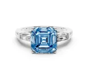Fancy Blue Asscher Cut Diamond Solitaire Ring Set in Platinum with Tapered Baguette Side Stones and Prong Setting
