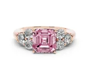 Fancy Pink Asscher Cut Diamond Cluster Ring Set in Rose gold with Round Accent Stones and Prong Setting on a Plain Band