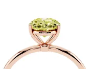 Fancy Yellow Oval Cut Diamond Solitaire Engagement Ring Set in Rose gold with Thin Band and Prong Setting