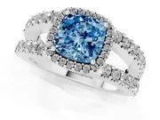 Fancy Blue Cushion Cut Diamond Halo Ring Set in Platinum with Pavé Split Shank and Prong Setting