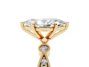 Marquise Cut Diamond Solitaire Engagement Ring Set in Yellow gold with Milgrain Bezel Accent Band