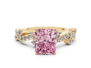 Fancy Pink Radiant Cut Diamond Solitaire Twisted Band Set in Yellow gold with Pavé Setting