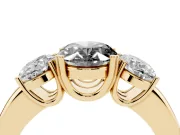 Fancy Black Oval Cut Diamond Three-Stone Ring Set in Yellow gold with Polished Band and Prong Setting
