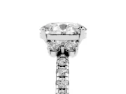 Oval Cut Diamond Three-Stone Pavé Ring Set in Platinum with Prong Setting
