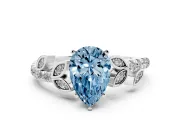 Fancy Blue Pear Cut Diamond Solitaire Leaf-Inspired Ring Set in White gold with Pavé Band and Prong Setting