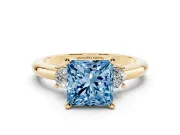 Princess Cut Three Stone Engagement Ring Setting for a Fancy Blue Lab-Grown Diamond | Round Side Stones | Yellow Gold
