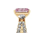 Fancy Pink Emerald Cut Diamond Three-Stone Ring Set in Yellow gold with Pavé Split Shank and Prong Setting