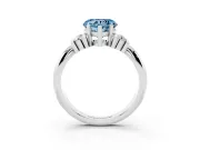 Fancy Blue Three-Stone Heart Cut Diamond Channel Set Ring Set in Platinum with Bar Prongs