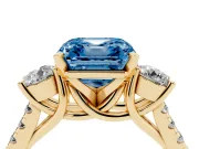 Fancy Blue Three-Stone Asscher Cut Diamond Pavé Band Ring Set in Yellow gold with Prong-Set Trio