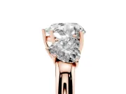 Heart Cut Diamond Three-Stone Ring Set in Rose gold with Bold Center and Classic Band